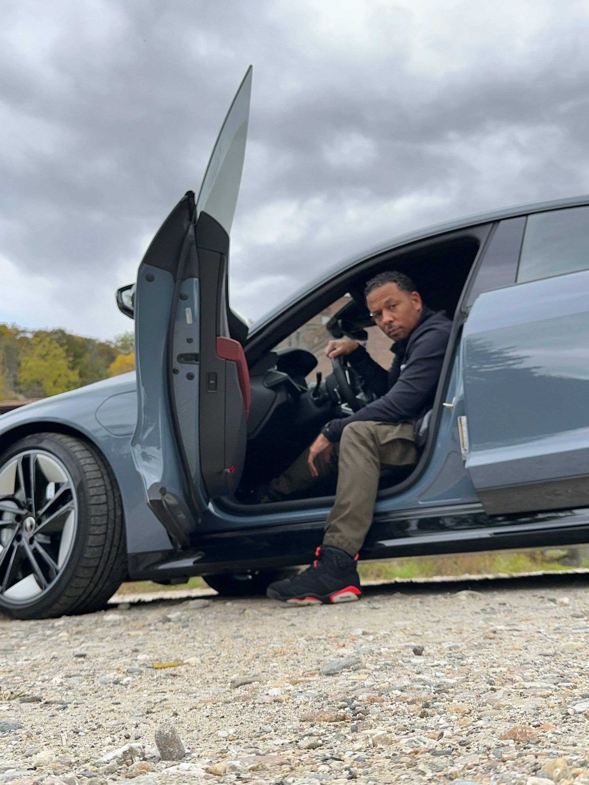 Daryl Killian with luxury SUV