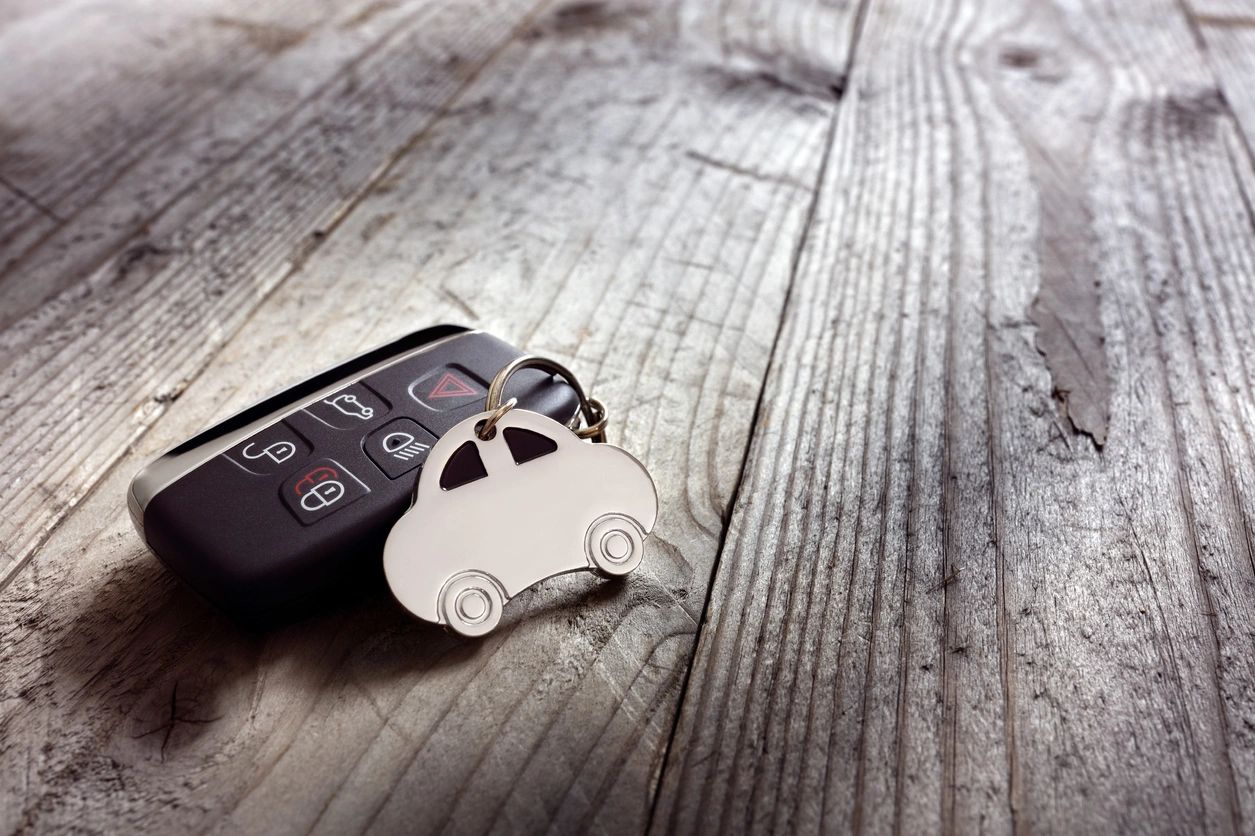 Car key fob on wooden surface